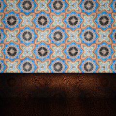 Image showing Wood table top and blur vintage ceramic tile pattern wall