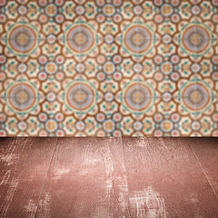 Image showing Wood table top and blur vintage ceramic tile pattern wall