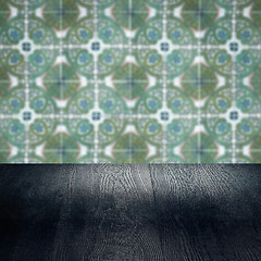 Image showing Wood table top and blur vintage ceramic tile pattern wall