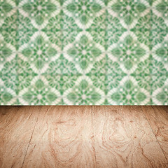 Image showing Wood table top and blur vintage ceramic tile pattern wall