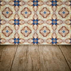 Image showing Wood table top and blur vintage ceramic tile pattern wall