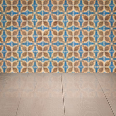 Image showing Wood table top and blur vintage ceramic tile pattern wall