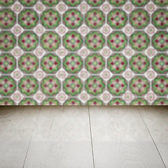 Image showing Wood table top and blur vintage ceramic tile pattern wall