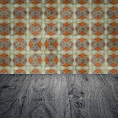 Image showing Wood table top and blur vintage ceramic tile pattern wall