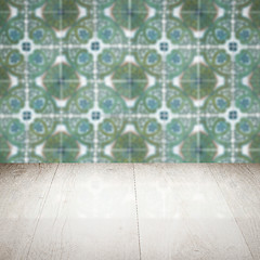 Image showing Wood table top and blur vintage ceramic tile pattern wall