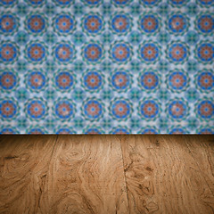 Image showing Wood table top and blur vintage ceramic tile pattern wall