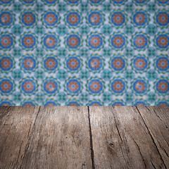 Image showing Wood table top and blur vintage ceramic tile pattern wall