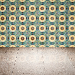 Image showing Wood table top and blur vintage ceramic tile pattern wall