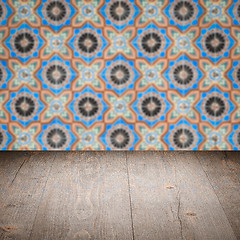 Image showing Wood table top and blur vintage ceramic tile pattern wall