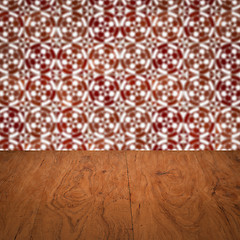 Image showing Wood table top and blur vintage ceramic tile pattern wall