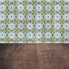 Image showing Wood table top and blur vintage ceramic tile pattern wall