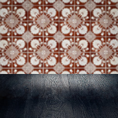 Image showing Wood table top and blur vintage ceramic tile pattern wall