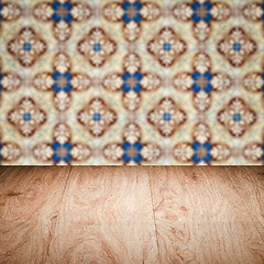 Image showing Wood table top and blur vintage ceramic tile pattern wall