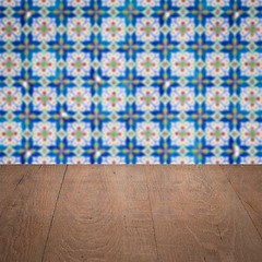 Image showing Wood table top and blur vintage ceramic tile pattern wall