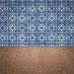 Image showing Wood table top and blur vintage ceramic tile pattern wall