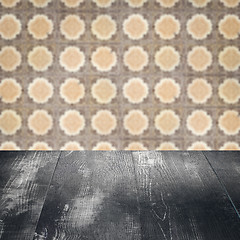 Image showing Wood table top and blur vintage ceramic tile pattern wall