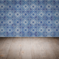 Image showing Wood table top and blur vintage ceramic tile pattern wall