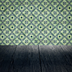 Image showing Wood table top and blur vintage ceramic tile pattern wall