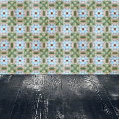 Image showing Wood table top and blur vintage ceramic tile pattern wall