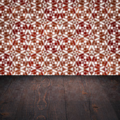 Image showing Wood table top and blur vintage ceramic tile pattern wall