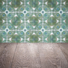 Image showing Wood table top and blur vintage ceramic tile pattern wall