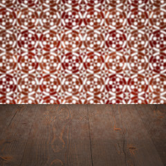 Image showing Wood table top and blur vintage ceramic tile pattern wall