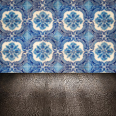 Image showing Wood table top and blur vintage ceramic tile pattern wall