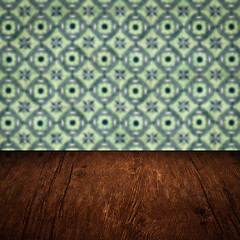 Image showing Wood table top and blur vintage ceramic tile pattern wall