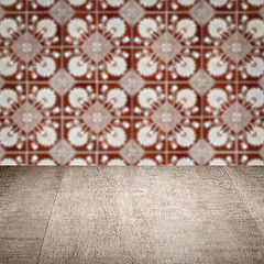 Image showing Wood table top and blur vintage ceramic tile pattern wall