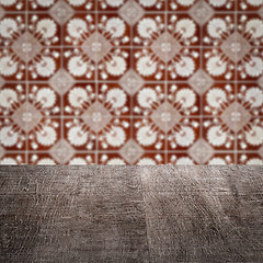 Image showing Wood table top and blur vintage ceramic tile pattern wall