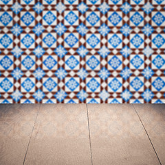 Image showing Wood table top and blur vintage ceramic tile pattern wall