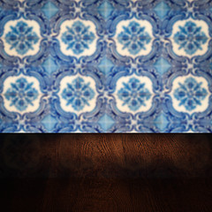 Image showing Wood table top and blur vintage ceramic tile pattern wall