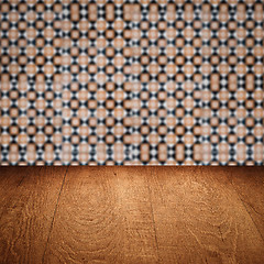 Image showing Wood table top and blur vintage ceramic tile pattern wall