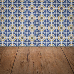 Image showing Wood table top and blur vintage ceramic tile pattern wall