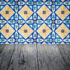 Image showing Wood table top and blur vintage ceramic tile pattern wall