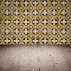 Image showing Wood table top and blur vintage ceramic tile pattern wall