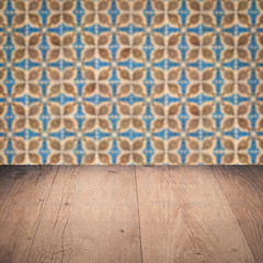 Image showing Wood table top and blur vintage ceramic tile pattern wall