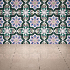 Image showing Wood table top and blur vintage ceramic tile pattern wall