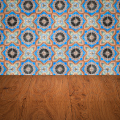 Image showing Wood table top and blur vintage ceramic tile pattern wall