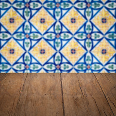 Image showing Wood table top and blur vintage ceramic tile pattern wall