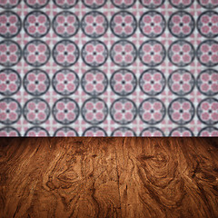 Image showing Wood table top and blur vintage ceramic tile pattern wall