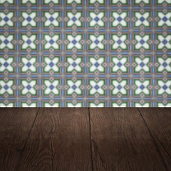 Image showing Wood table top and blur vintage ceramic tile pattern wall