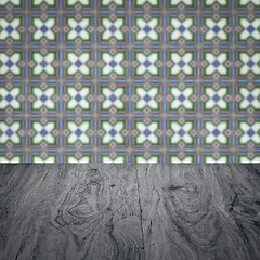 Image showing Wood table top and blur vintage ceramic tile pattern wall