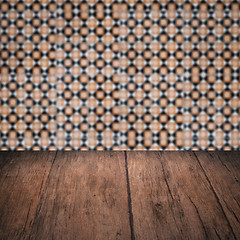 Image showing Wood table top and blur vintage ceramic tile pattern wall