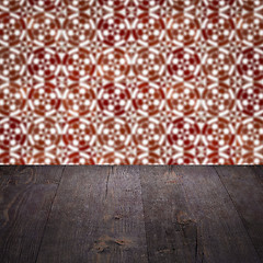 Image showing Wood table top and blur vintage ceramic tile pattern wall