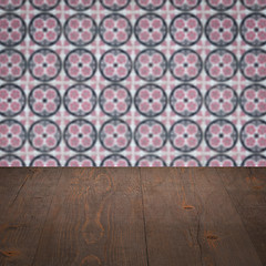 Image showing Wood table top and blur vintage ceramic tile pattern wall