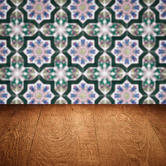 Image showing Wood table top and blur vintage ceramic tile pattern wall