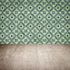 Image showing Wood table top and blur vintage ceramic tile pattern wall