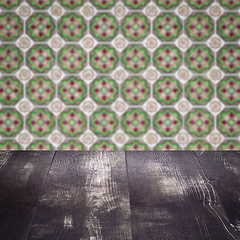 Image showing Wood table top and blur vintage ceramic tile pattern wall