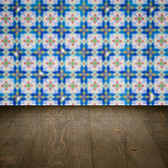 Image showing Wood table top and blur vintage ceramic tile pattern wall